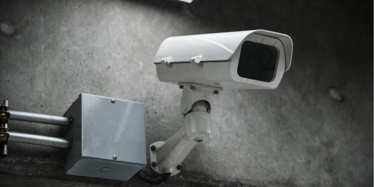 closeup cctv camera wall 66a287a7